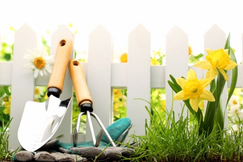Trained gardening staff wearing protective equipment