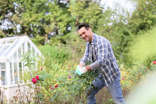 Oakleigh Park gardening team focused on detailed garden care